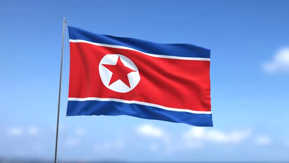 Flag of North Korea waving in the sky