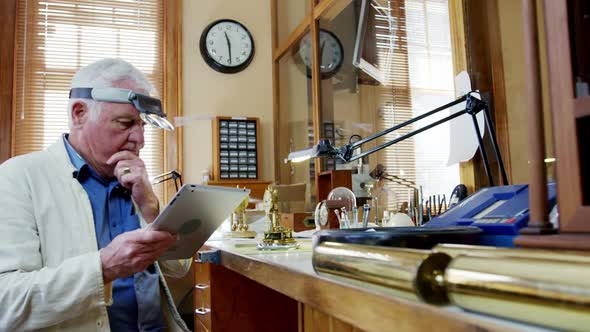 Horologist using digital tablet