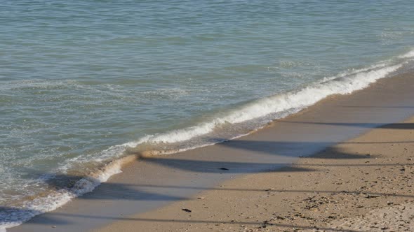 French Normandy  sword beach by the day with silhouettes of flags on sand 4K 2160p 30fps  HD footage alt
