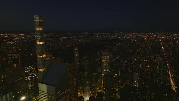 Descending Footage of Illuminated Tall Office Towers in City