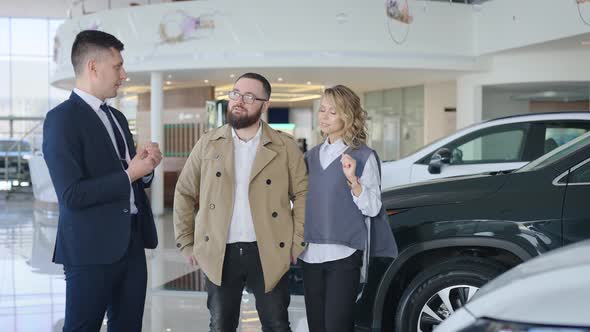 Sales Manager in a Car Dealership Serves a Married Couple