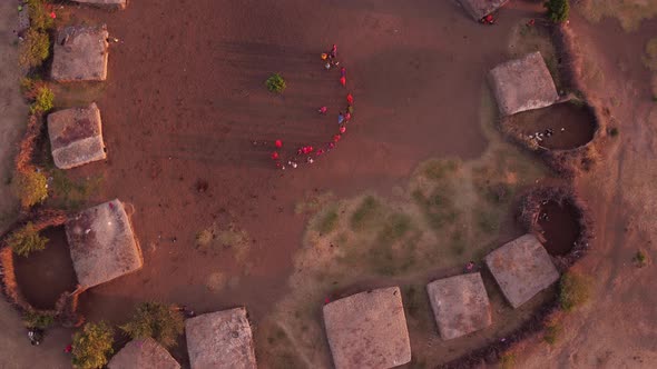 Aerial of a Maasai village with people