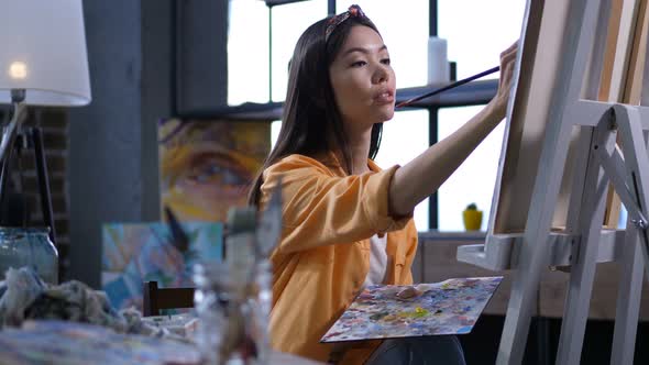 Talented Painter Making a Painting at Art Studio