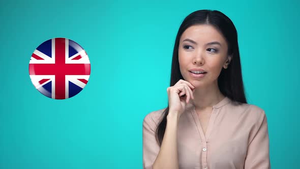 Female Student Pushing Great Britain Flag Button, Ready to Learn Language