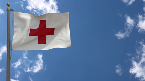 Red Cross Flag On Flagpole