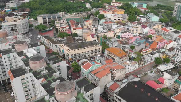 Aerial drone shot over old town tilt reveal, Taipa Village, Macau