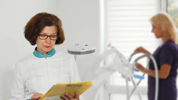 Senior Female Doctor Showing Thumbs Up Posing at the Hospital 1080p