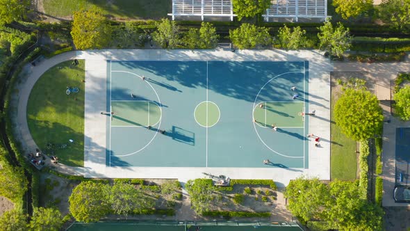  Aerial Top View on Outdoor Basketball Court with Athletes Throwing a Ball alt