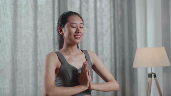 Close Up Portrait Of Young Asian Athletic Female In Sports Clothes Doing Yoga In Tree Pose