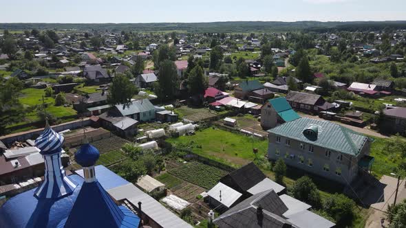 Rural Village with Christian Church in Countryside