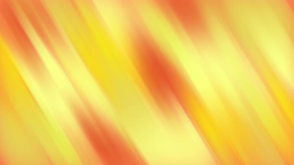 Twisted vibrant gradient blurred of yellow orange and red colors with smooth movement