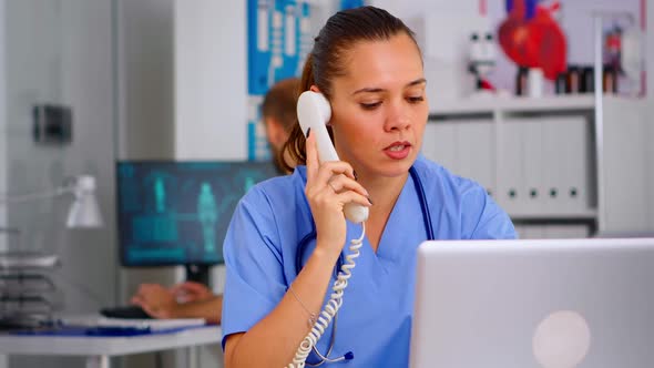 Medical Practitioner Answering Phone Calls