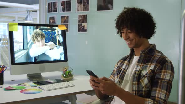 Young man working in a creative office