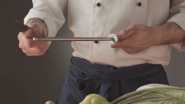 Professional Cooker Preparing an Instrument for Work