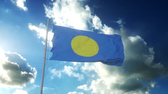 Republic of Palau flag waving at wind against beautiful blue sky