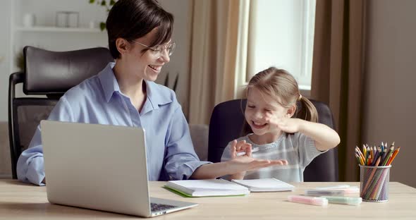 Happy Family Adult Parent Mother Helping Motivating Teenage School Girl Doing Homework Giving High