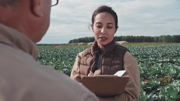 Discussing Plans with Farm Owner