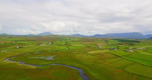 Aerial of green farmland 4k