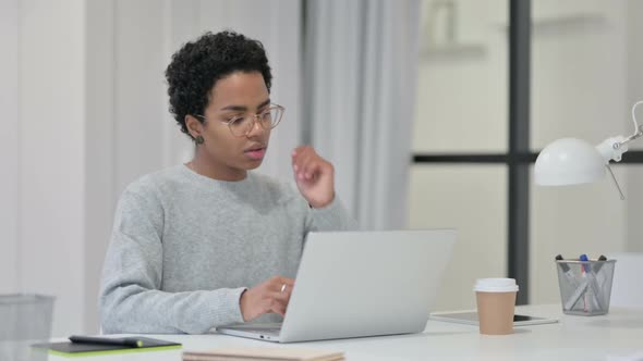 African Woman Having Neck Pain While Using Laptop