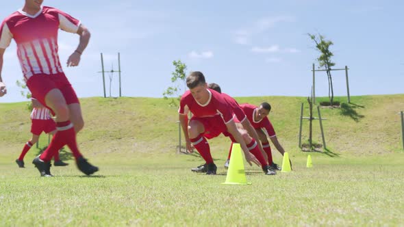 Soccer players training on field