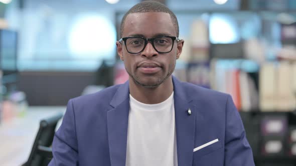 Portrait of African Businessman Looking at Camera