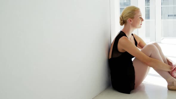 Ballerina relaxing in studio