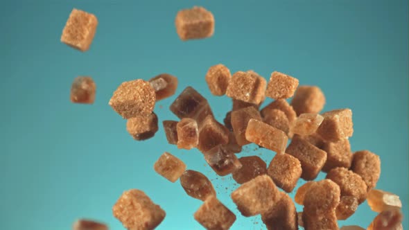Super Slow Motion Cubes of Cane Sugar Rise Up and Fall Down