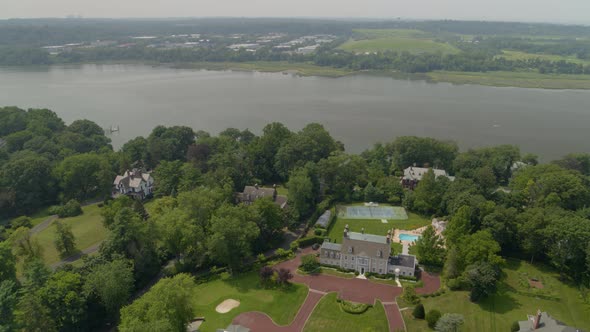 Aerial Panning Shot of Roslyn Village and Hempstead Harbor in Long Island