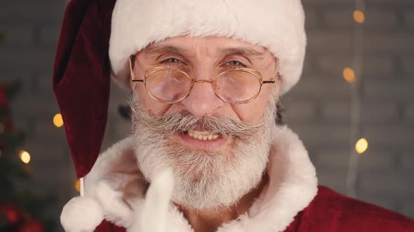 Young Bearded European Senior Man in Santa Hat Close-up Portrait