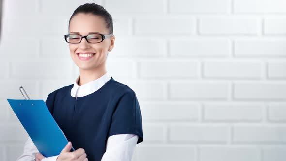 Portrait of Successful Business Woman Smiling and Looking at Camera