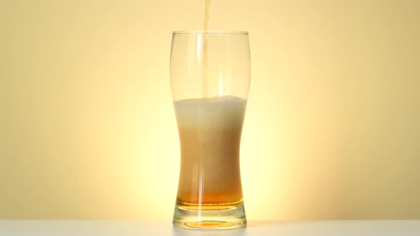 Beer pouring into glass