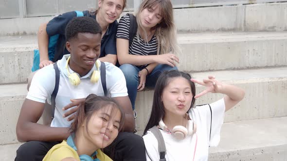 POV of a Group of Smiling Multiethnic Teenage Students Taking a Selfie