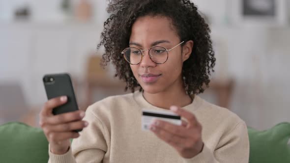 Portrait of Online Shopping on Smartphone By African Woman 