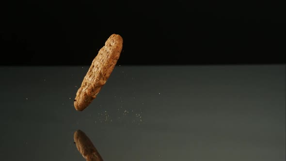 Cookies falling and bouncing in ultra slow motion 1500fps - reflective surface - COOKIES PHANTOM 