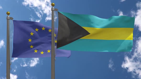 European Union Flag Vs Bahamas Flag On Flagpole