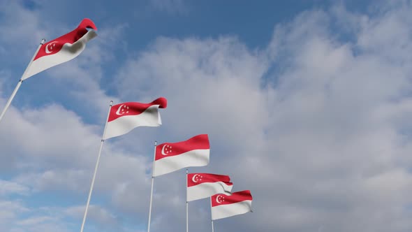 Waving Flags Of The Singapore blue sky