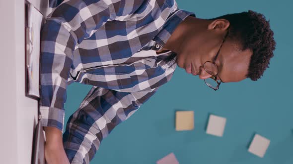 Vertical Video Stressed Freelancer Feeling Tired About Overtime Work on Laptop