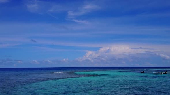 Aerial view abstract of coastline beach by blue water with sand background