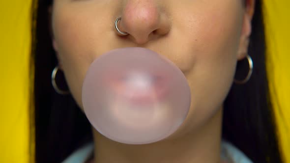 Woman Eating Bubble Gum Blowing Ball Chawing Close Up Female Mouth and Lips
