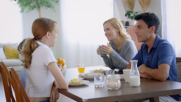 Happy Family Enjoying Breakfast