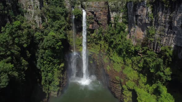 Drone shot of Mac Mac Fall in South Africa - drone is descending in front of the waterfall. Snippet