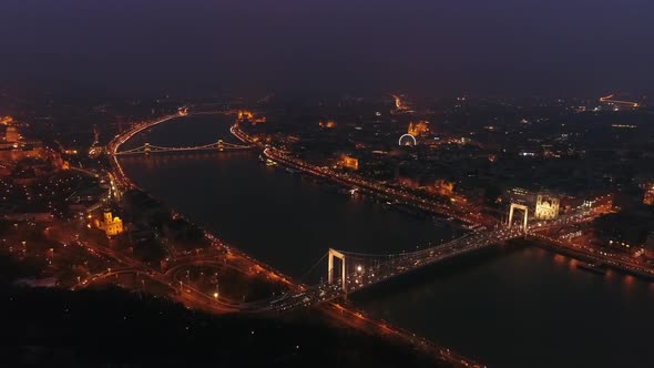 Aerial view of Chain bridge and river Danube in Budapest, Hungary at night.