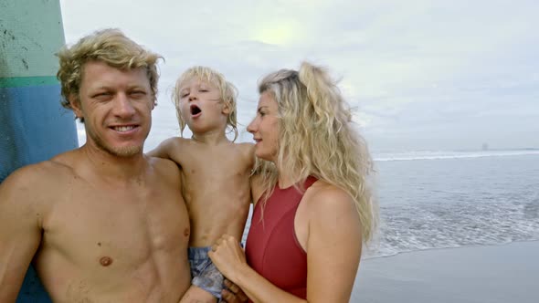 Happy Family Posing on Beach