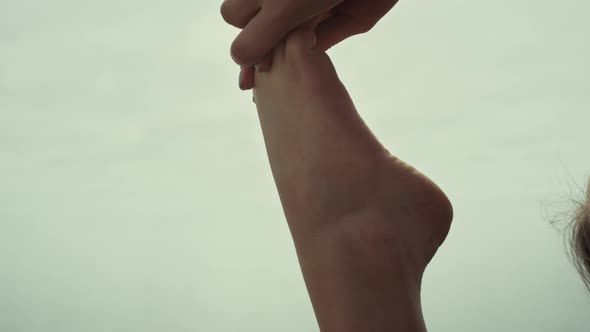 Closeup Girl Bare Feet Stretching Beach