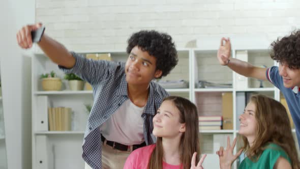 Pupils Making Selfie in Classroom