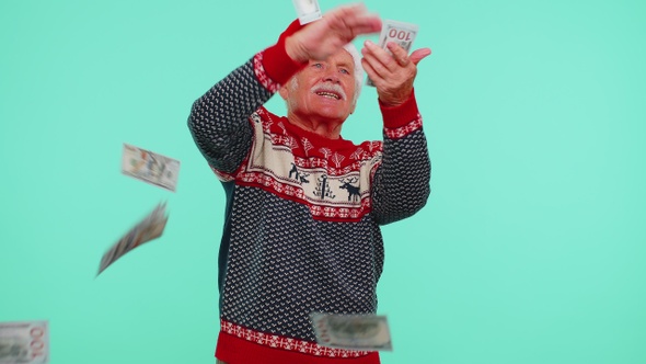 Rich Senior Man Winner in Christmas Red Sweater Showing Wasting Throwing Money Around Shopping