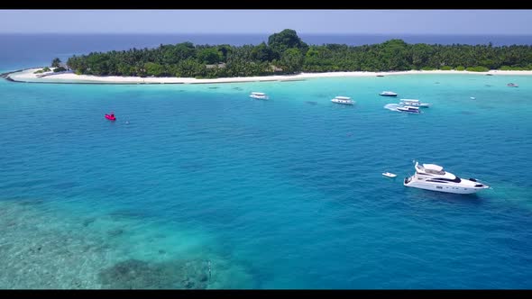 Aerial flying over tourism of marine sea view beach lifestyle by blue water with white sandy backgro