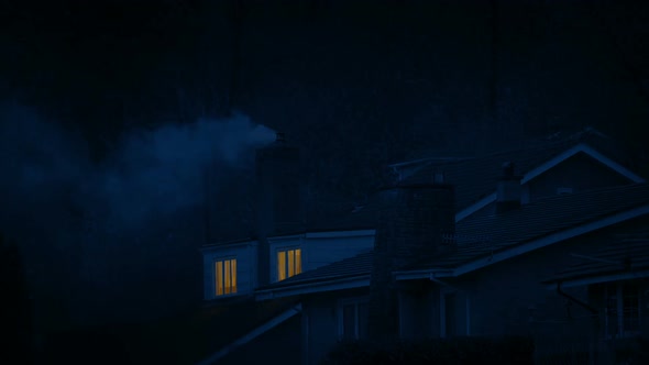 Houses At Night With Smoke From Chimney