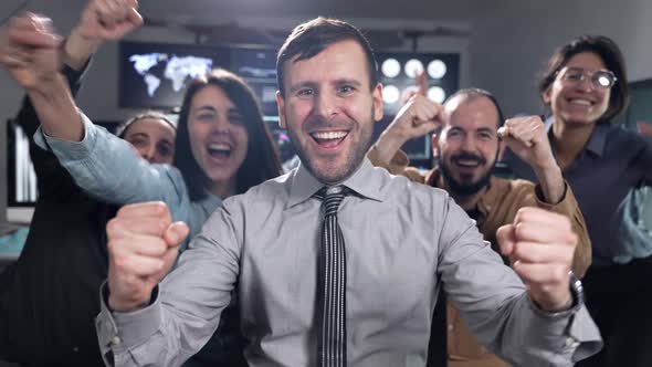 Team of Business People Celebrating Party Success at Stock Exchange Office