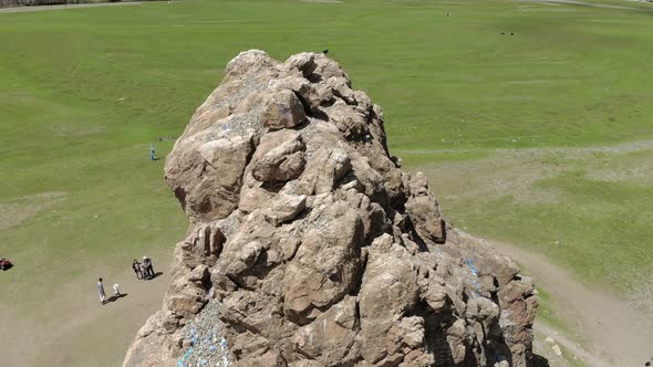 Tourists Religious Symbol Taikhar Chuluu Rock in Arkhangai Aimag, Mongolia